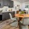a kitchen with a dining table and chairs